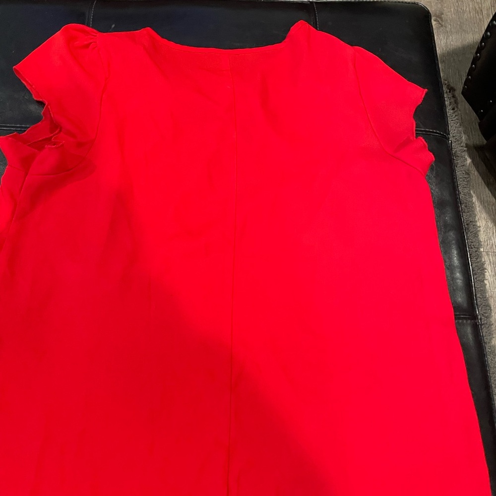 Red woman’s blouse size 14